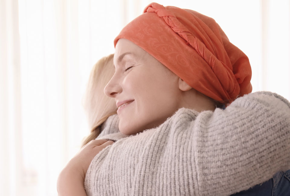 Oncology patient in a hug