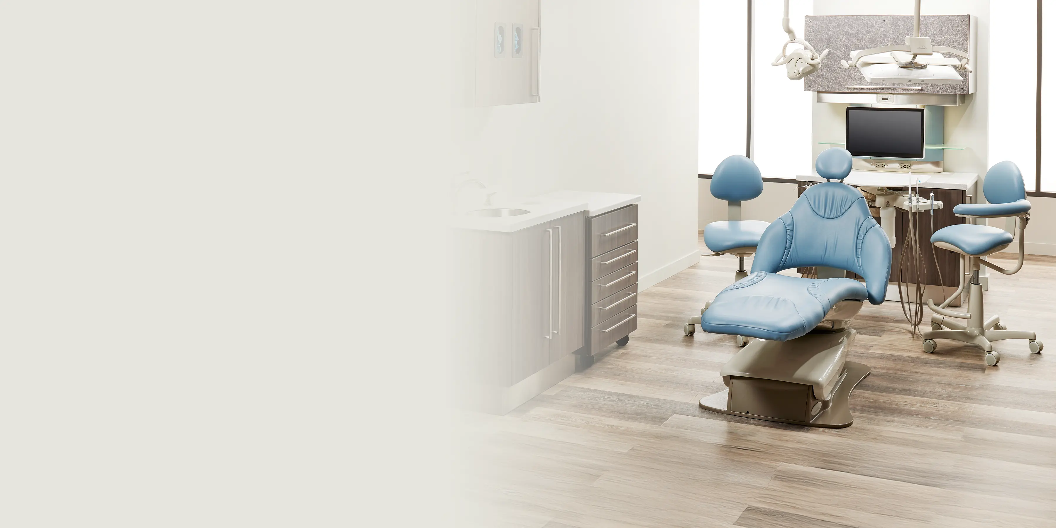 dental workspace layout with sky-blue upholstery